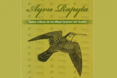 La imagen muestra la foto del libro Ayvu Rapyta, con el dibujo de un colibrí